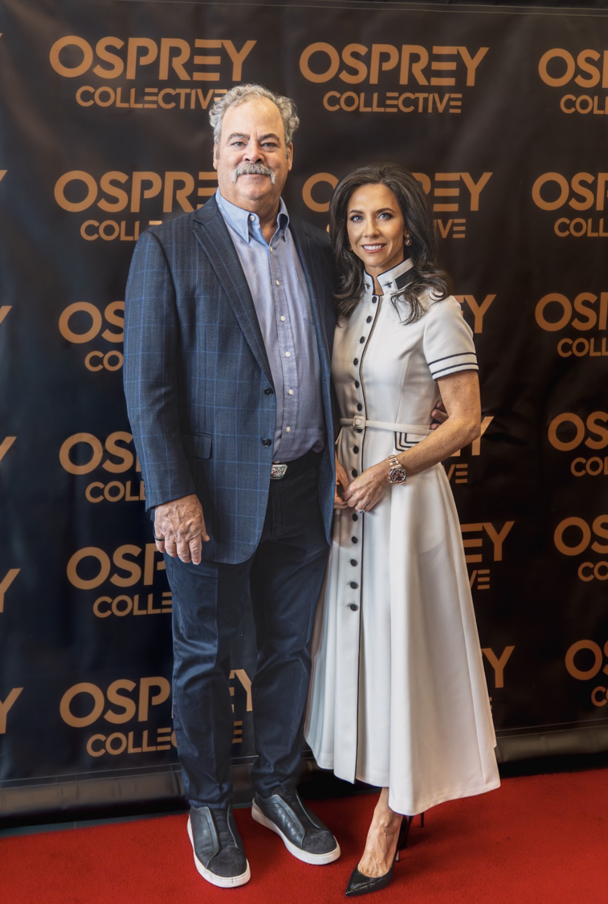 Guests on the Osprey Collective step-and-repeat